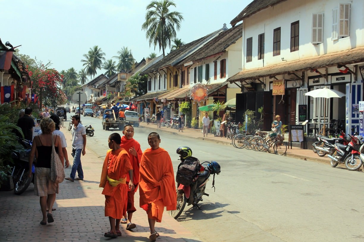 monks on busy street