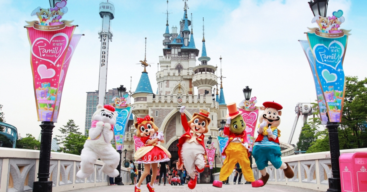 mascots in front of castle