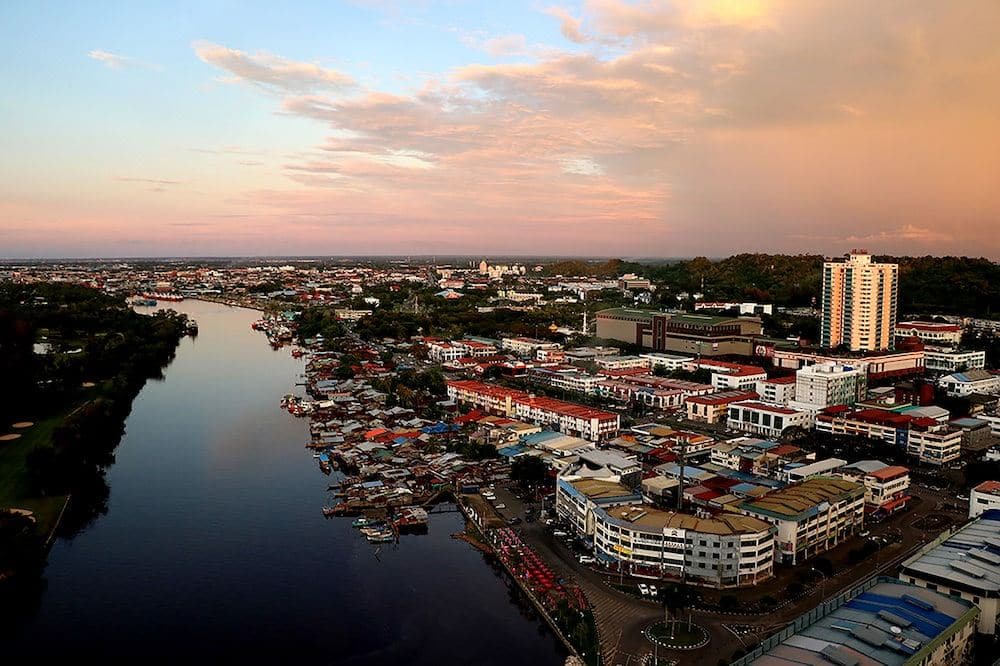 river and buildings miri