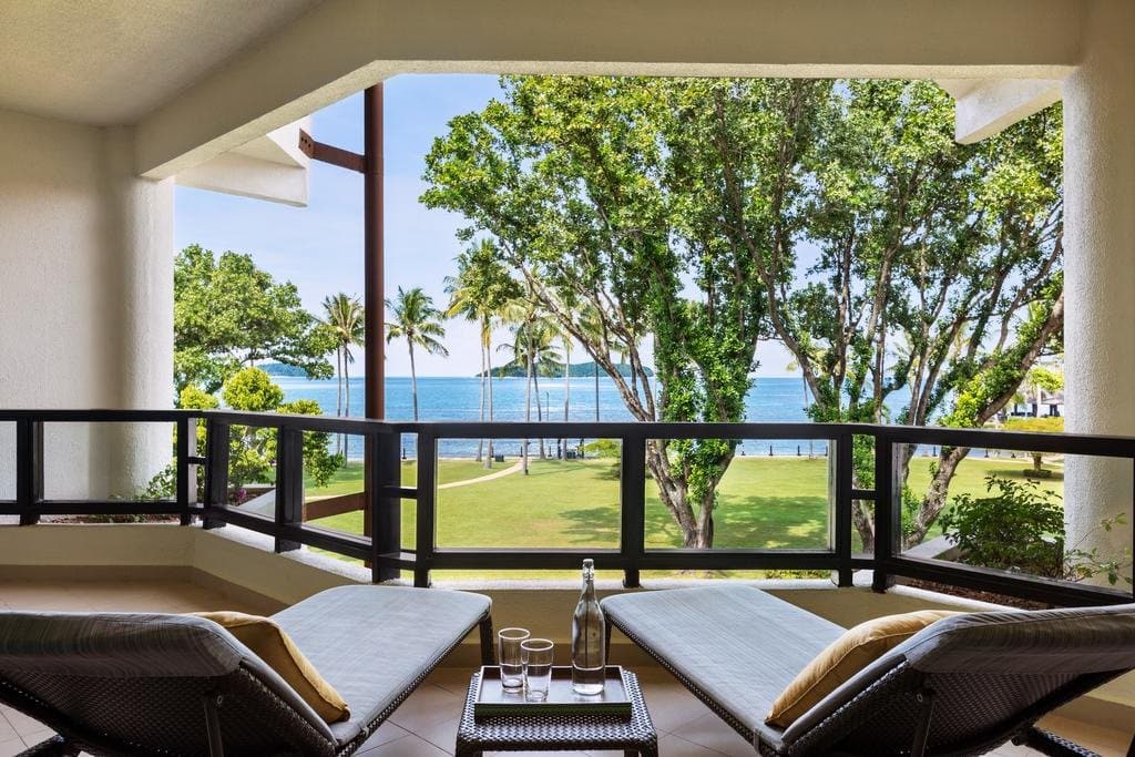 chairs in balcony overlooking garden